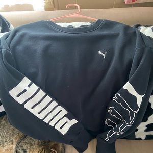 Puma xl but I wear a small or xsmall and it’s a good lose fit